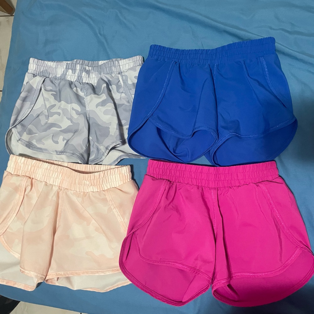Girls Run Shorts All in Motion. 4 shorts, blue, pink, light pink camo, gray camo